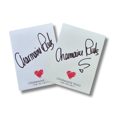 An autographed book plate with logo.
